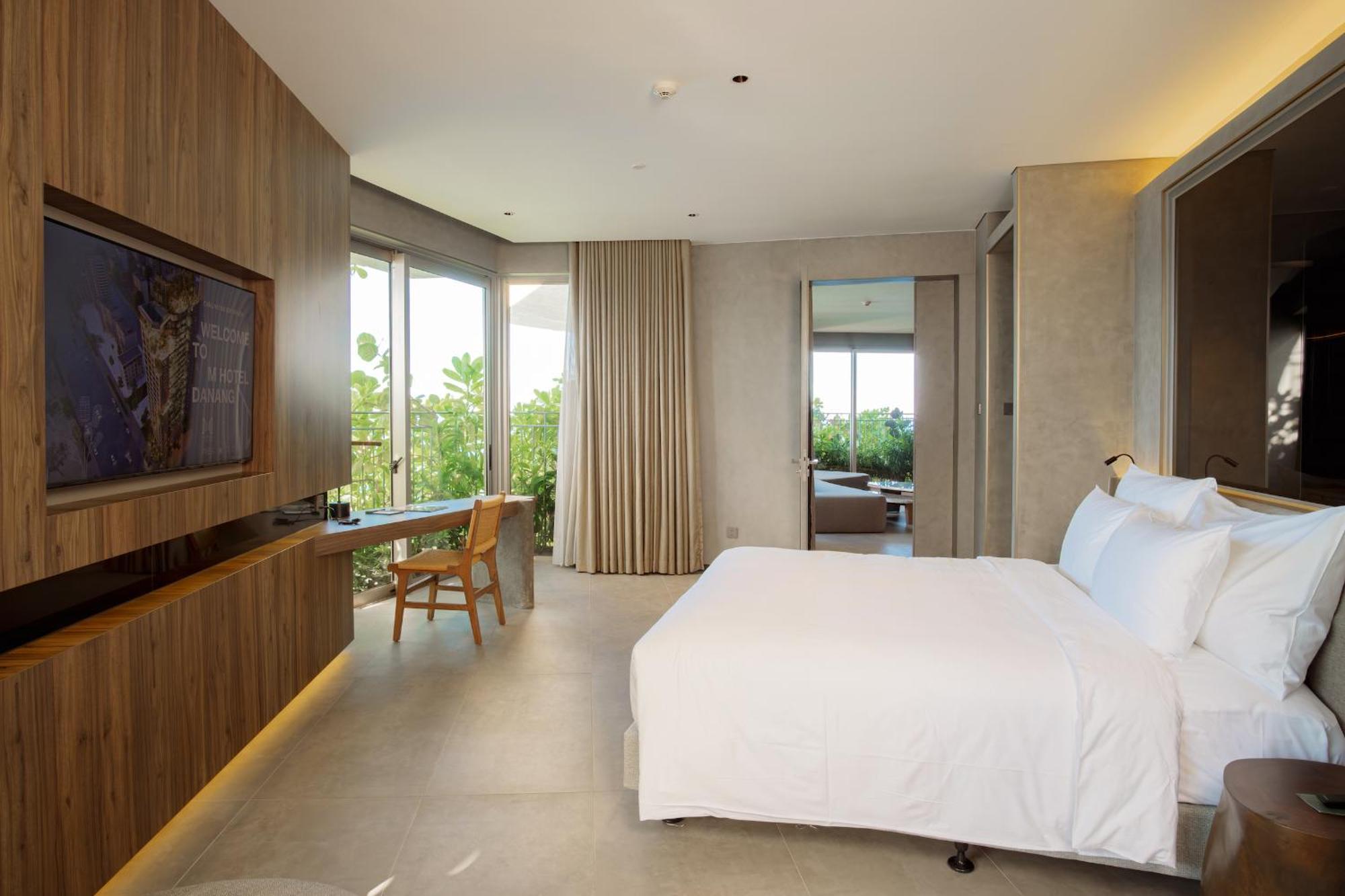 M Hotel Danang Exteriör bild A bedroom at the hotel